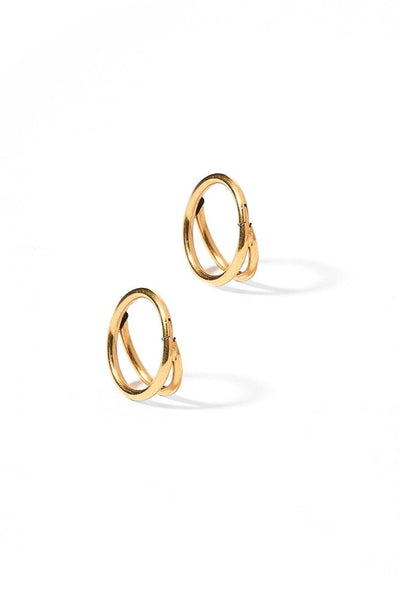 Pair of gold hoop earrings on a white background