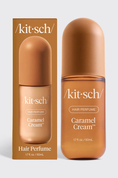 Kit Sché Caramel Cream Hair Perfume bottle and its matching brown cardboard packaging box, displayed side-by-side on a light gray background.