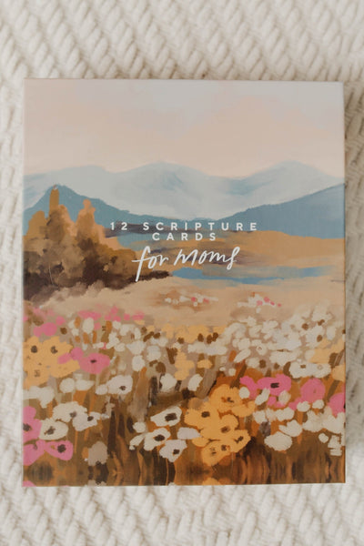 Card with a scenic illustration of mountains and flowers, labeled '12 Scripture Cards for Moms'.