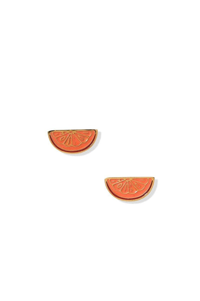Two orange slice earrings on a white background