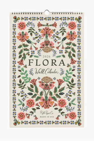 Flora wall calendar with floral design on a white background