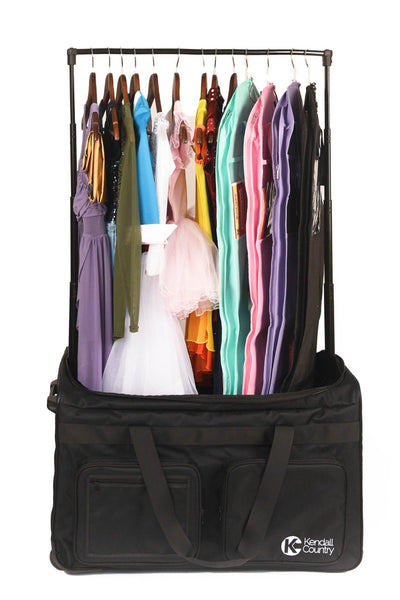 Black garment bag with clothes on hangers against a white background