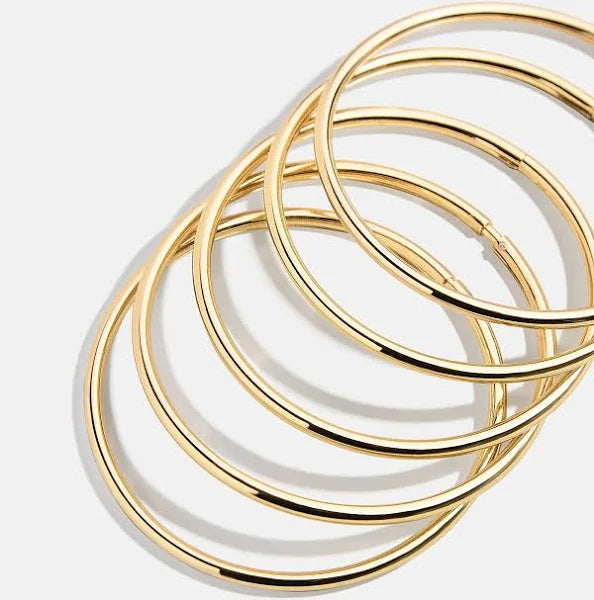 Rev Statement Gold Bangle